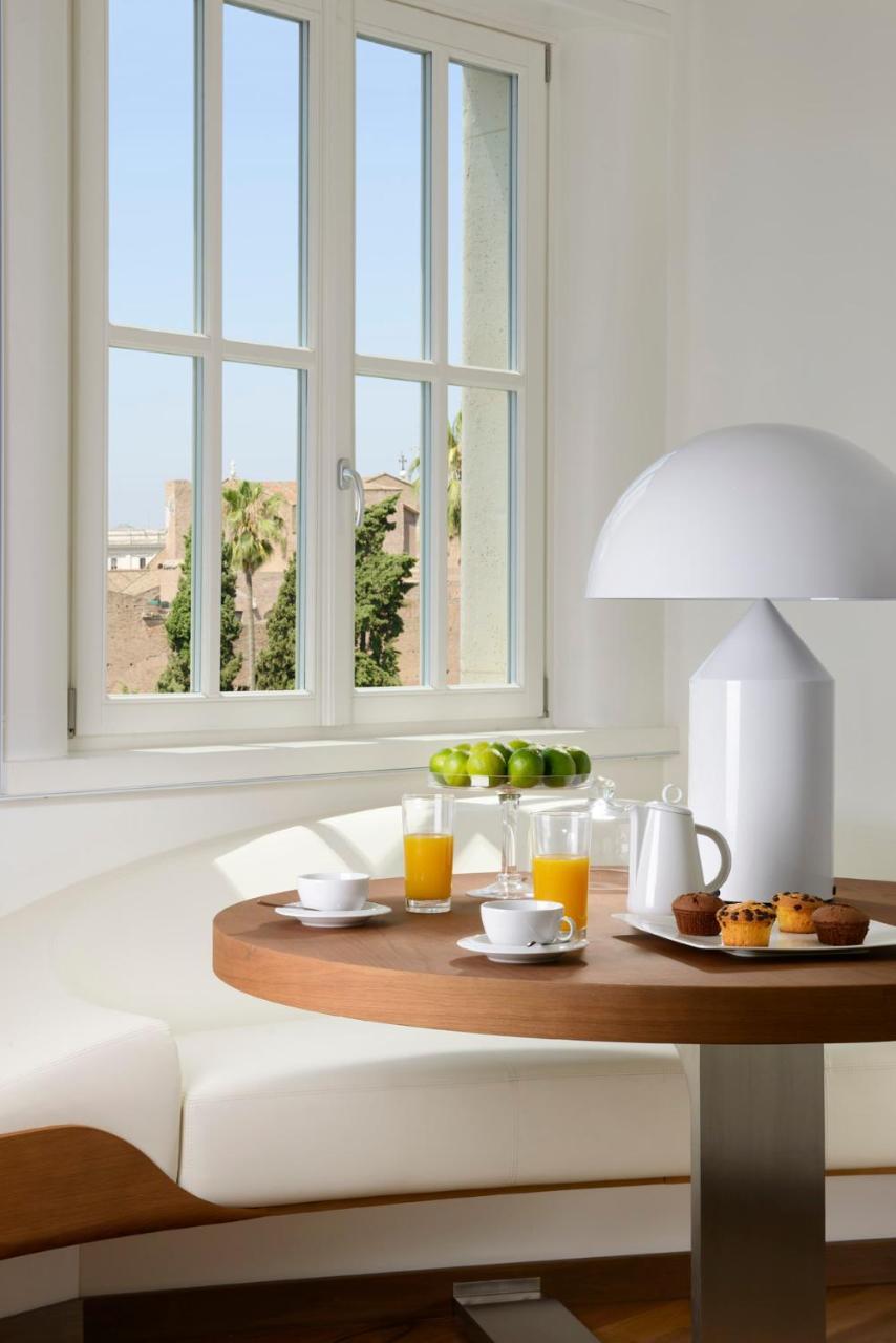 Palazzo Montemartini Rome, A Radisson Collection Hotel Екстериор снимка A lamp by Artemide